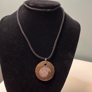 N77. Fossil necklace.